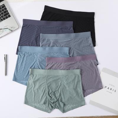 China Newest Design High Waist Ice Silk Nylon Seamless Men's Breathable Boxers Briefs Underwear for sale