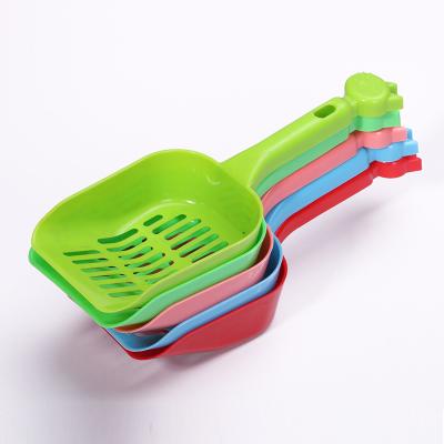 China New plastic cat dug convenient cat litter shovel excrement take cat excrement shovel sand leak shovel for sale