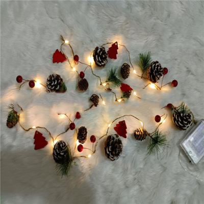 China New Handwork Style Garland with Red Berries Pine Cones and Warm White LED Lights Christmas Garlands for Front Door for sale