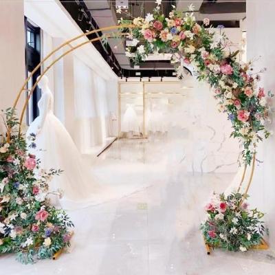 China Eco-friendly an iron acrylic rattan plant shelf rack display stand wall decoration silver wedding semicircle silk flower arch for sale