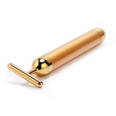 China Peel Tightening Cosmetics For Women Face Gold Vibration 24k Massage Beauty Stick Facial Slimming Roller for sale