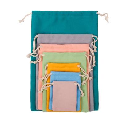 China Custom Foldable Sundries Bag Storage Muslin Fabric Cotton Single Drawstring Bag for sale