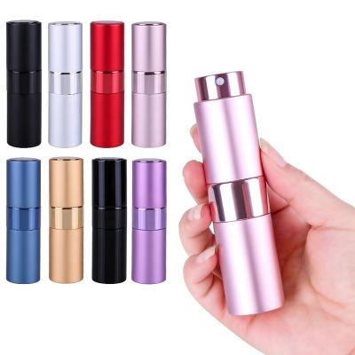 China Personal Care BinQi Wholesale Fancy Cylinder 15ml Portable Perfume Bottles for sale