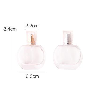 China New Design Luxury Personal Care 30ml Round Atomizer Silver Pump Empty Refillable Glass Perfume Bottle for sale