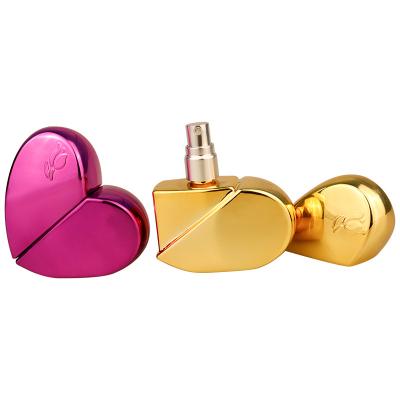 China Personal Care BinQi Manufacturer Hot Sale 25ml Colored Heart Fancy Perfume Bottles for sale