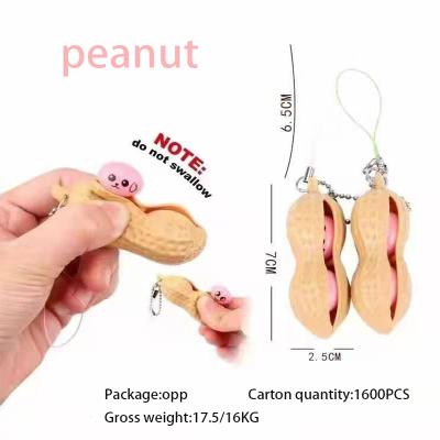 China Relieve Stress Noises Trigger Squeezed Bean Peanut Toy Decompression Keychain Trigger Busy Person Toy for Kids and Adults for sale