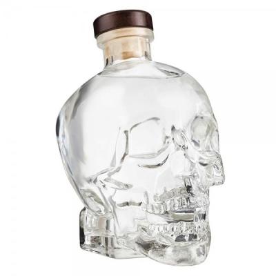 China 1200Ml Beverage Makers British Standard Skull Vodka Bottle For Lid for sale