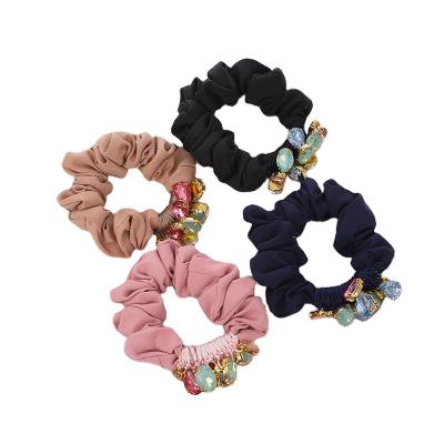 China Fashionable Women's Girl's Hair Decoration Rhinestone Ball Hair Rope Elastic Thick Rubber Belt Pants Hair Clip Rope for sale