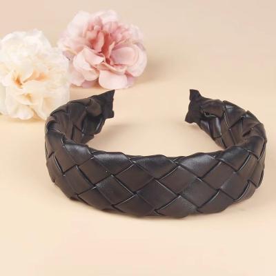 China New Classic Handmade Twisted Leatherette Braid Headband Casual Solid Luster Wide Brim Headdress Hair Band For Women for sale