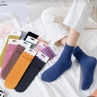 China New Korean style breathable cotton winter pure color kids girls slouch long socks for women 2021 dropshipping for sale