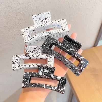 China Manufacturer Directly Manufacturer Directly 8.5cm Shiny Black White White Claw Clip Stain Design Premium Korean Simple Hair Clip for sale