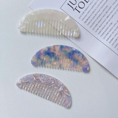 China 9cm Home Small Round Detangling Acetic Braiding Teasing Hair Comb Loose Marble Tortoise Tooth Pocket Cellulose Acetate Wide Comb for sale