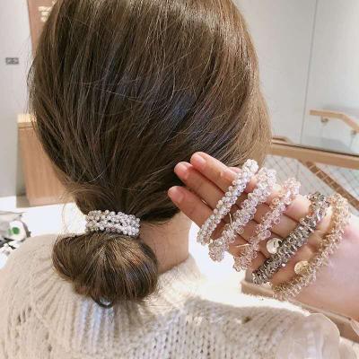 China 2021 Women Girls Smart Casual Ponytail Hair Accessories Beaded Ring Rope Pearl Crystal Rhinestones Bracelet Hair Tie With Metal Charm for sale