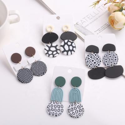 China Vintage Black White Boho Geometric Simple African Ear Drop Down Polymer Round Long Poly Clay Moon Earrings for sale