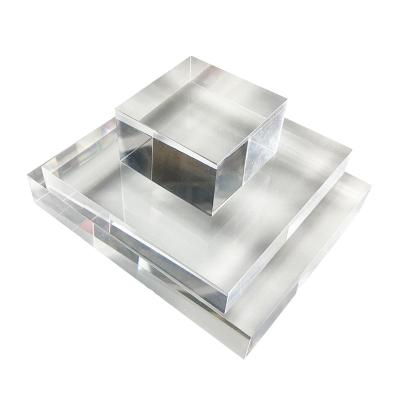 China Showing goods wholesale size solid acrylic jewelry block in custom transparent cube base display for jewelry counter for sale