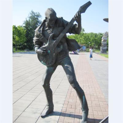 China Europe Music Style Bronze Large Playing Guitar Statues For Sale for sale