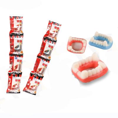 China 8g Halloween Normal Vampire Alert Funny Fangs Shape Gummy Candy In Body Parts Item With Individual Packaging for sale