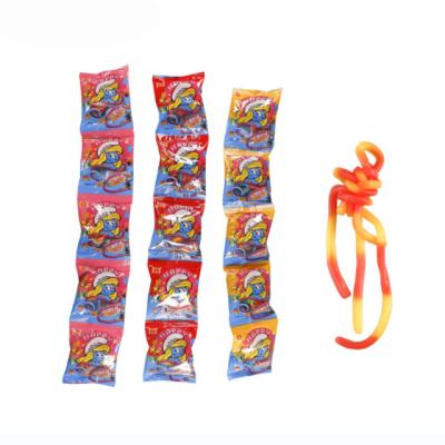 China Good Quality 10g Natural Magic Rainbow Extra Long Colorful Strings Gummi Or Gummy Noodles Candy for sale