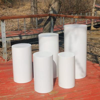 China Showing Xinkeda Acrylic Cylinder Display Pedestal For Exhibitions Weddings Round Pedestals Display Cylinder White Acrylic Wedding for sale