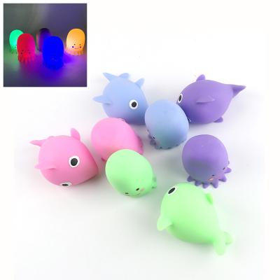 China Light Up Fluffy Animal Dolphin Octopus Light Up Sea Animal Flashing Fluffy Ball Toy Squishy Hand Fidget Sensory Kids Gift for sale