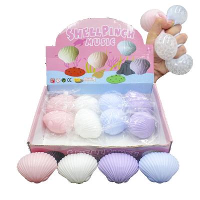 China Hot Sale Eco-friendly Decompression Squeeze Relief Toy Shell Shape Exhale Squeeze Ball Squeeze Ball With Beads for sale