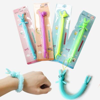 China Novelty Eco-Friendly TPR Stretch Stripper Toys DIY Cute Animal Pendant Relax Soft Plastic Wristband for sale