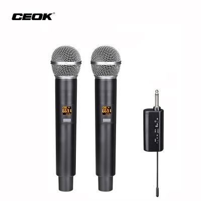 China KTV E58 Multifunctional Handheld Professional Performance Wireless Microphone FM KTV Stage Two Sing for sale