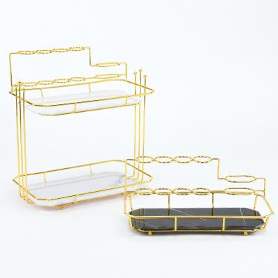 China Sustainable Luxury Metal Bathroom Accessories Toothpaste Holder Gold Storage Rack Toothbrush Holder for sale