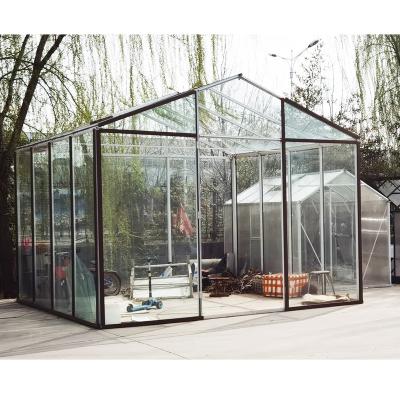 China Stable structure easily assembled small green house glass greenhouse garden with drawing and design for sale