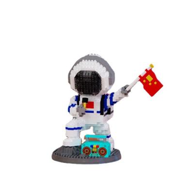 China Hot Selling Toy Hot Sale Toy Amazon Building Singing Space Puzzle Components Luminous Children's Astronaut Doll Plastic Model for sale