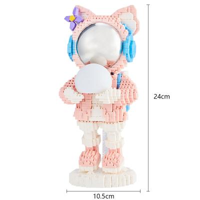 China Toy Fox's Electronic Luminous Astronaut Microparticle Belle Hold Moon Building Block Family Assembly Adult Educational Orn Toys for sale