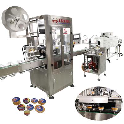 China Food Shrink Sleeve Labeling Machine For Fabric Strips With Heat Shrink Tunnel for sale