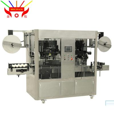 China Food Double Heads High Capacity Shrink Sleeve Labeling Packaging Machine For PET/Glass/Plastic Bottles for sale