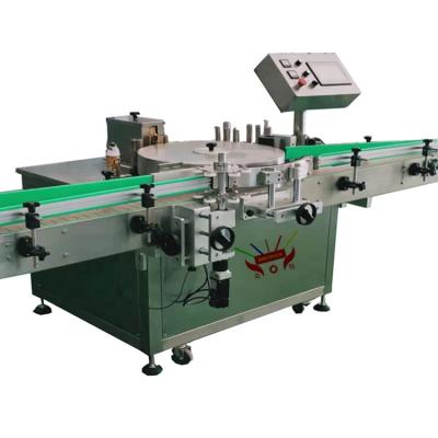 China Food OPP Labeling Machine Round Bottle Labeler Machine For Plastic Water Bottles for sale