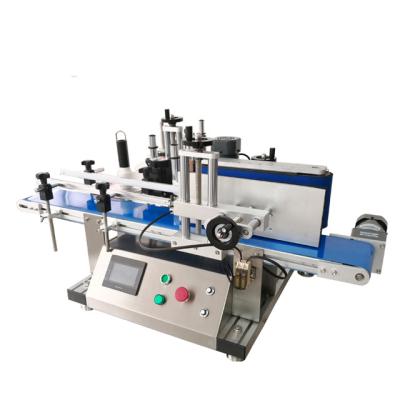 China Food manual semi automatic desktop sticker labeling machine for round bottles with date printing for sale