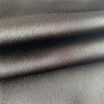 China keqiao waterproof polyester Shaoxing satin bubble black simple dyed fabric for blouse and dress for sale