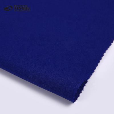 China New fashion woven memory royal blue color plain dyed 100% polyester foam crepe fabric for clothing for sale