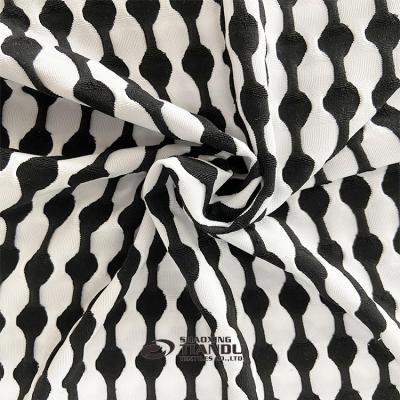 China Top quality stretch polyester spandex plain dyed jacquard knitting fabric for dress for sale