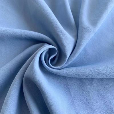 China Recycle And Dye Certificate Polyester Plastic 100% Recycled Fabric CDC Eco Friendly Plain Crepe Fabric For Women Dress for sale