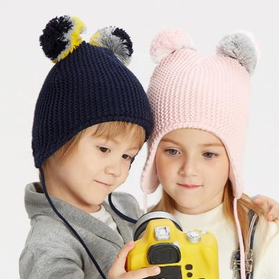 China COMMON Wholesale Natural Fur Pompom Kids Winter Knitted Hats Warm Fleece Striped Beanie Toddler Ear Hoods For Boys Girls Cute Kids for sale