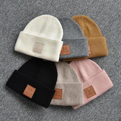 China COMMON Winter Knit Wide Cuff Hat Cable Wool Beanie For Women Men's Custom Logo Unisex Skull Beanie Cap for sale