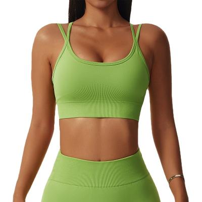 China Breathable Comfortable Sports Bra Yoga Fitness Solid Color Crossover Sports Bra Cross Tops For Women for sale