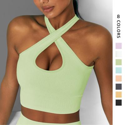 China Breathable Sport Tops Woman Gym Cross Straps Sexy Seamless Running Bra Fitness Yoga Workout Bra for sale