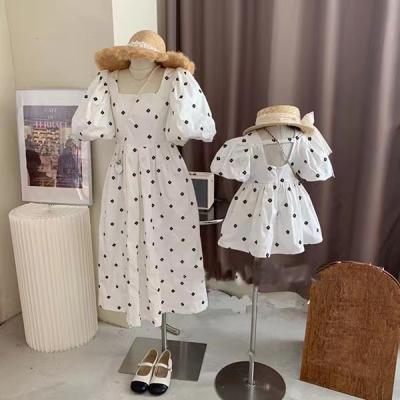 China 2022 New Summer Wholesale Parent-child Dress Mother And Daughter White Spotted Suit QUICK-DRY Suit for sale