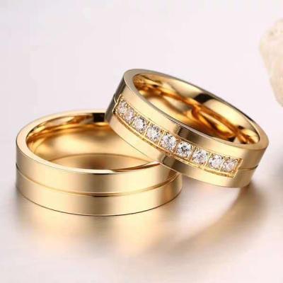 China Romantic 18K Gold Plated Stainless Steel Material Couple Rings Jewelry Zircon Ring for sale