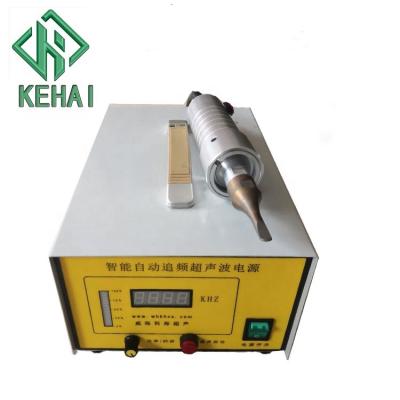 China Ultrasonic Fabric Cutting Handheld Ultrasonic Fabric Cutting Machine for sale