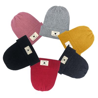 China JOINT In-Stock Knitted Women Hats Beanie With Label Custom Winter Beanie Warm Hats for sale