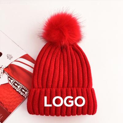 China Beanie With Pom Pom Fleece Beanie Wholesale Custom Embroidered Hat With Logo Knitted Beanies With Pom Pom Custom for sale