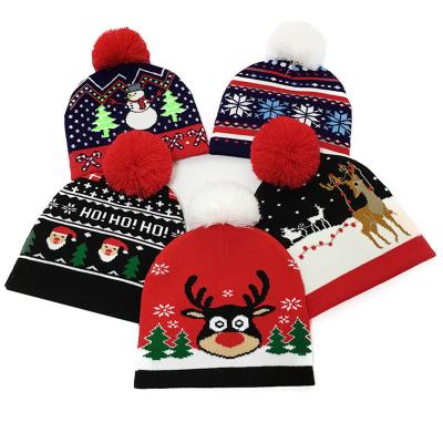 China JOINT Wholesale Knit Hats Winter Animal Jacquard Beanie Hat With Warm Christmas Beanie Hat Lady Pom Pom Hat for sale