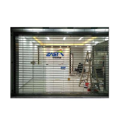 China Contemporary Stainless Steel Flower Door Crystal Hot Sale Transparent Security Uvioresistant Store Mall Roller Shutter Door for sale